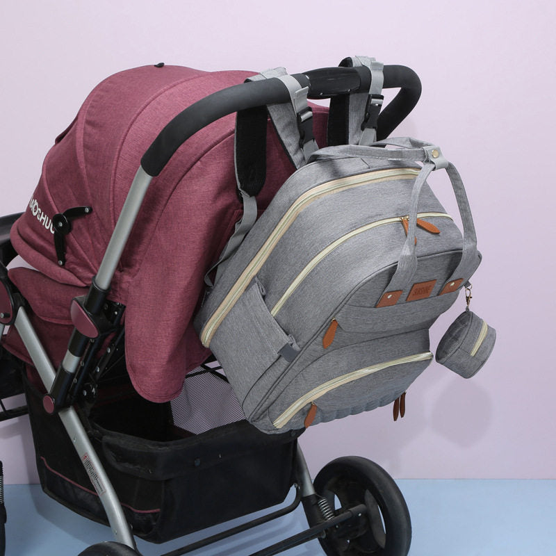 Canvas mommy backpack with bottle pockets