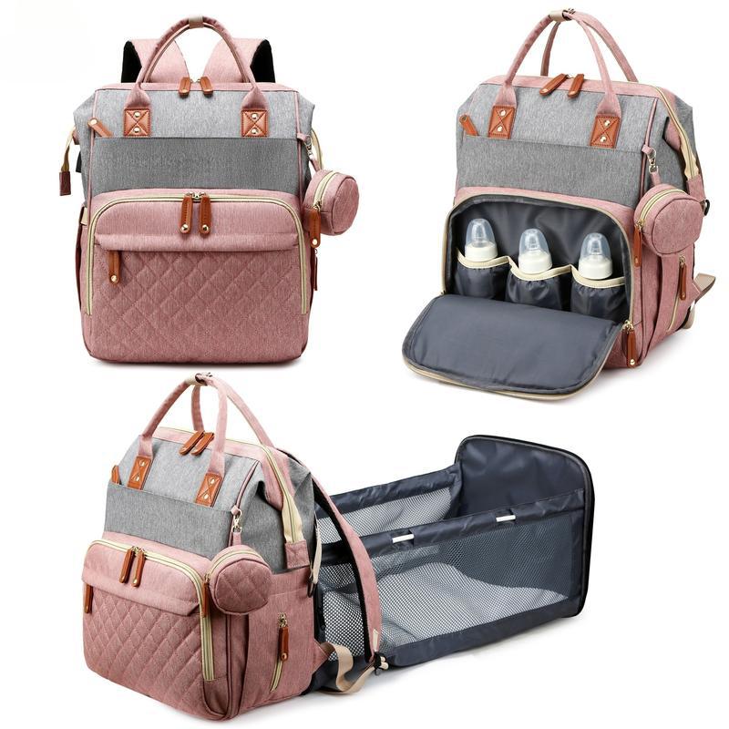 Waterproof diaper backpack with changing pad