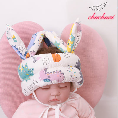 Protective Baby Cap - Double-Eared White Dinosaur