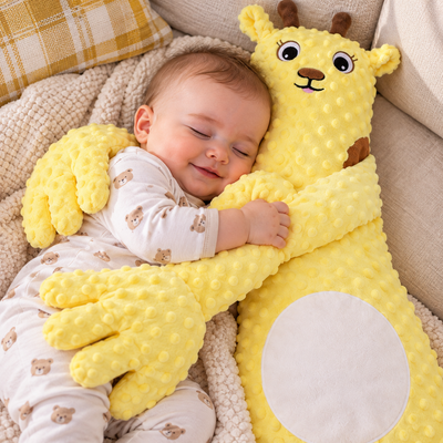 Soothing Sleep Comforter close-up with baby hugging giraffe