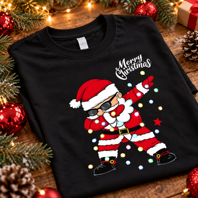 Close-up of the black cotton Christmas T-shirt with dabbing Santa and Merry Christmas print